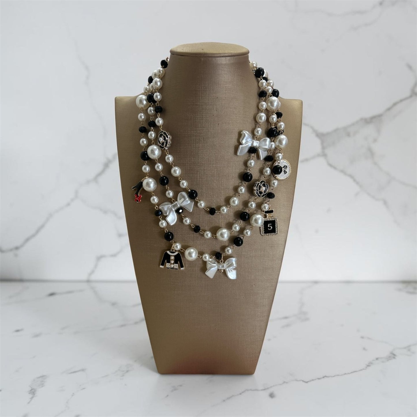 Collana tre fili