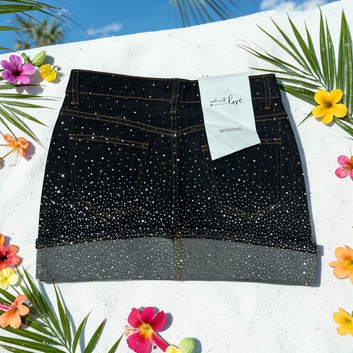 Minigonna in denim con risvolto e strass